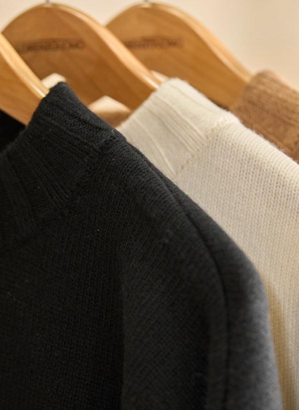 hanging women's cashmere sweaters