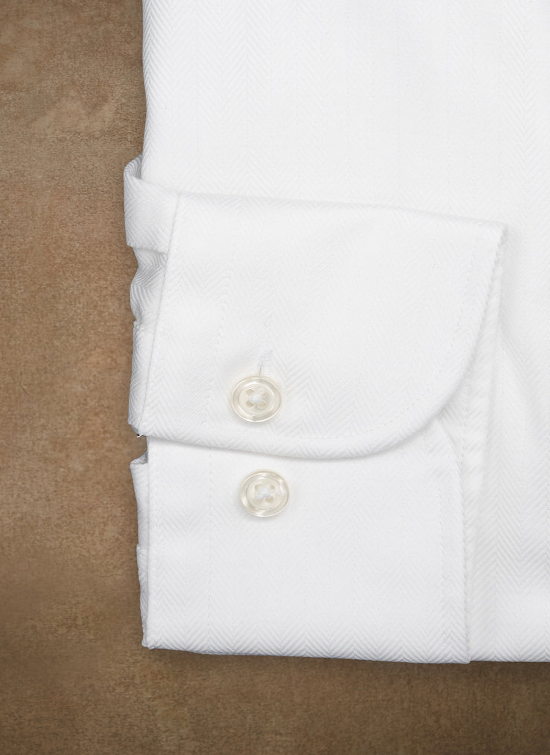 barrel cuff detail of Alexander in White Herringbone Shirt with ivory buttons